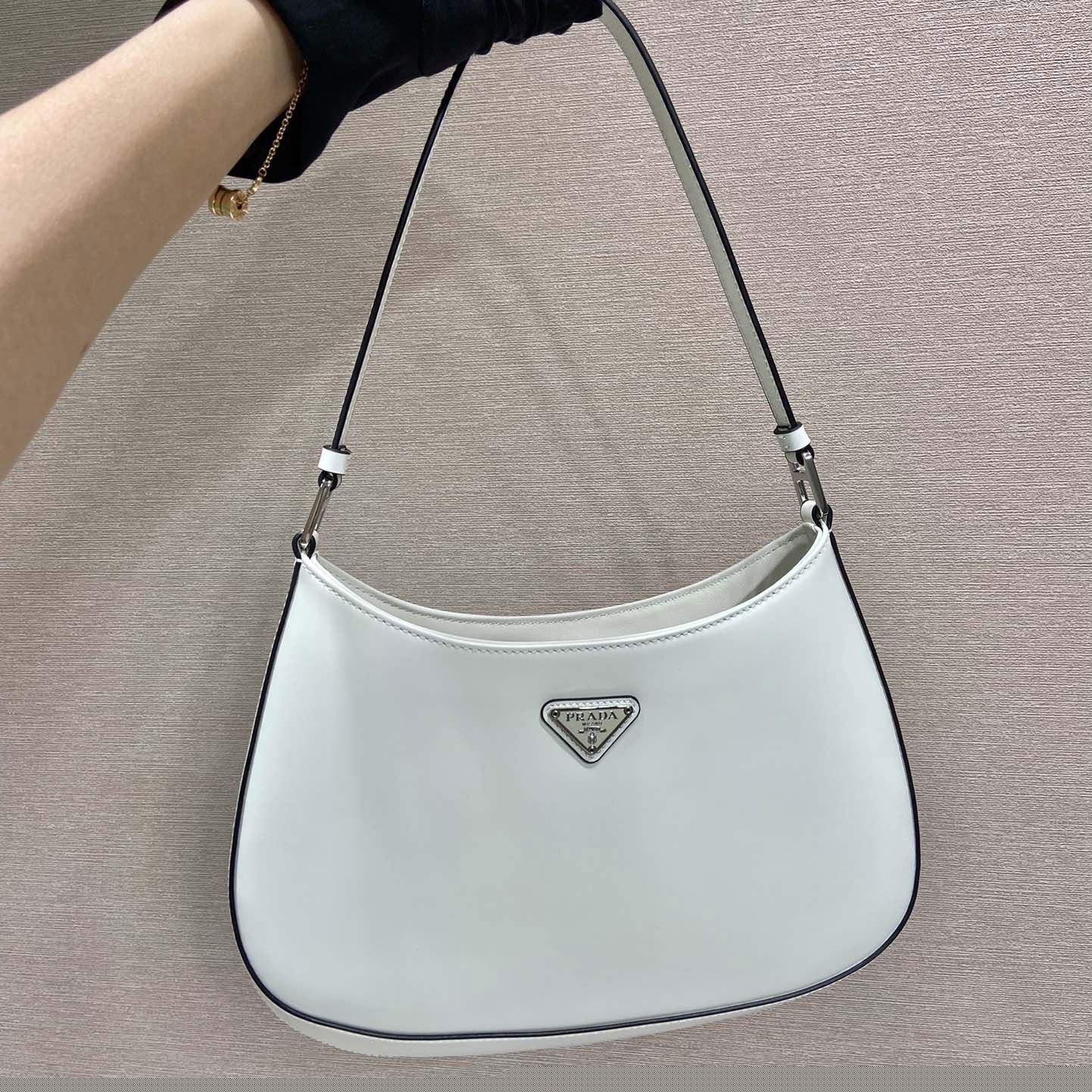 Pra*a top handle bags